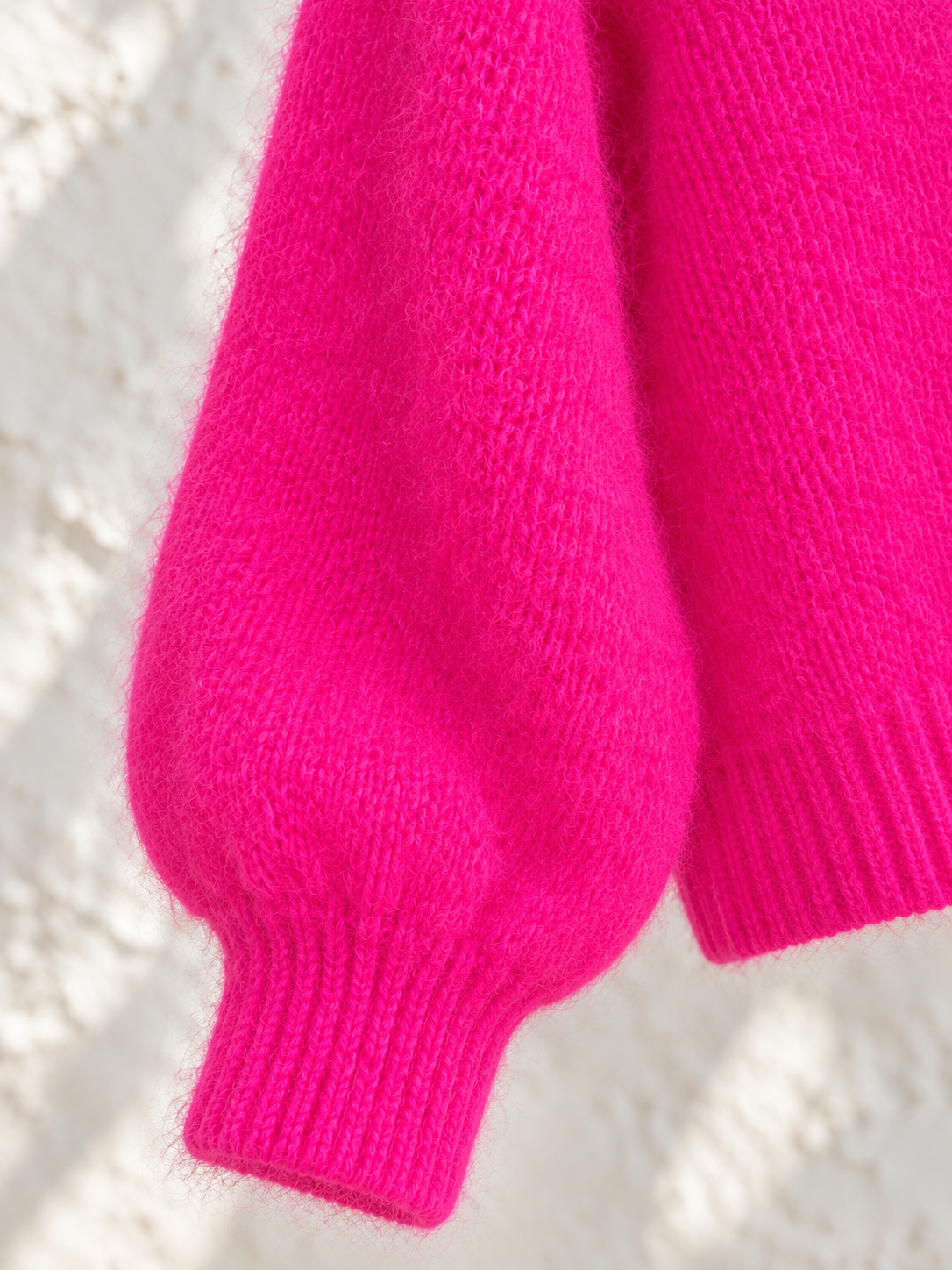 Chaqueta fucsia con capucha